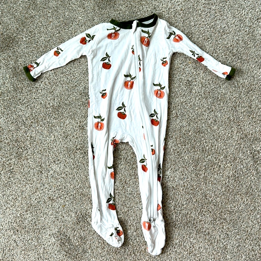 6-12 m Kyte Baby footies- persimmon, play for wash wear and a couple tiny spots